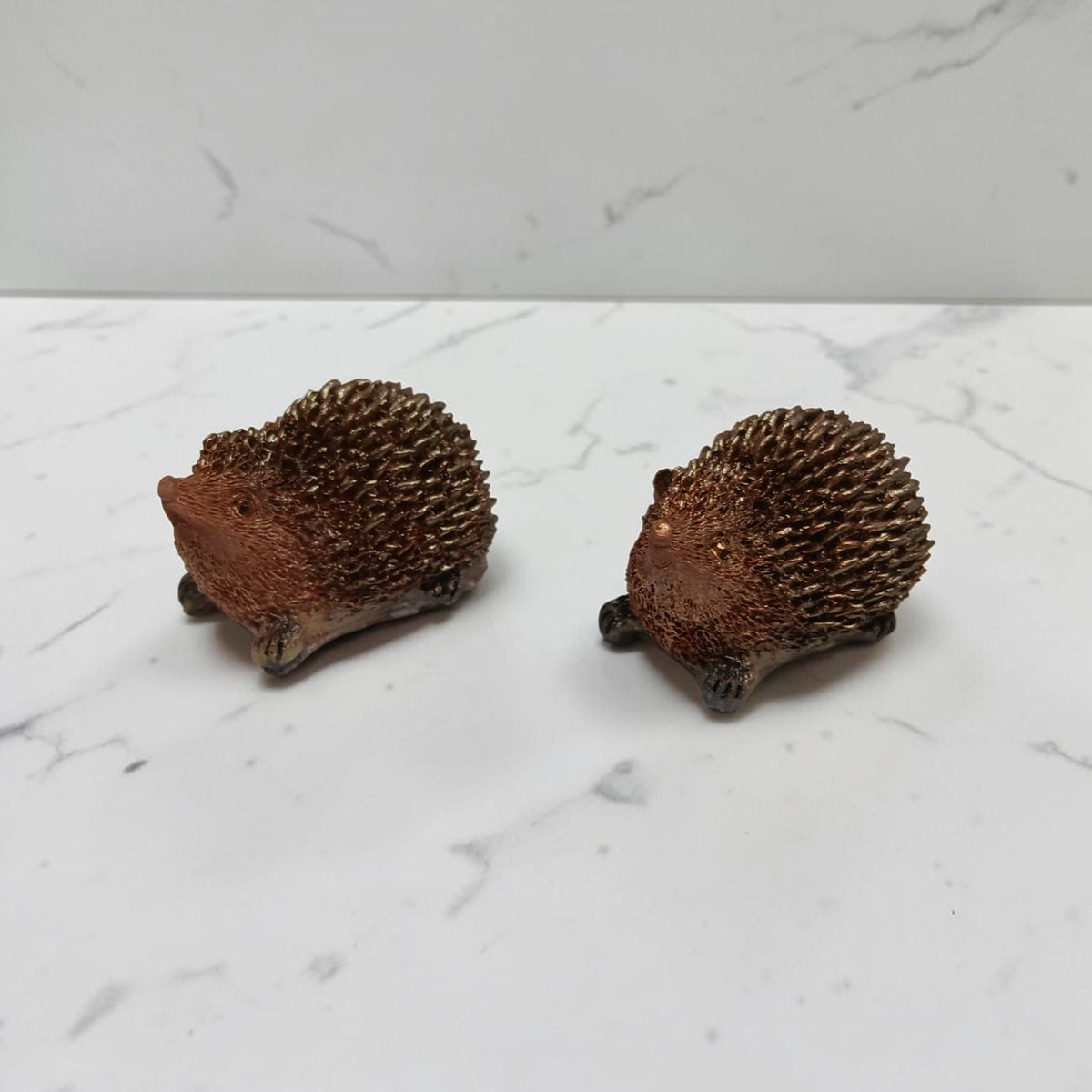 Cute little handmade resin hedgehogs