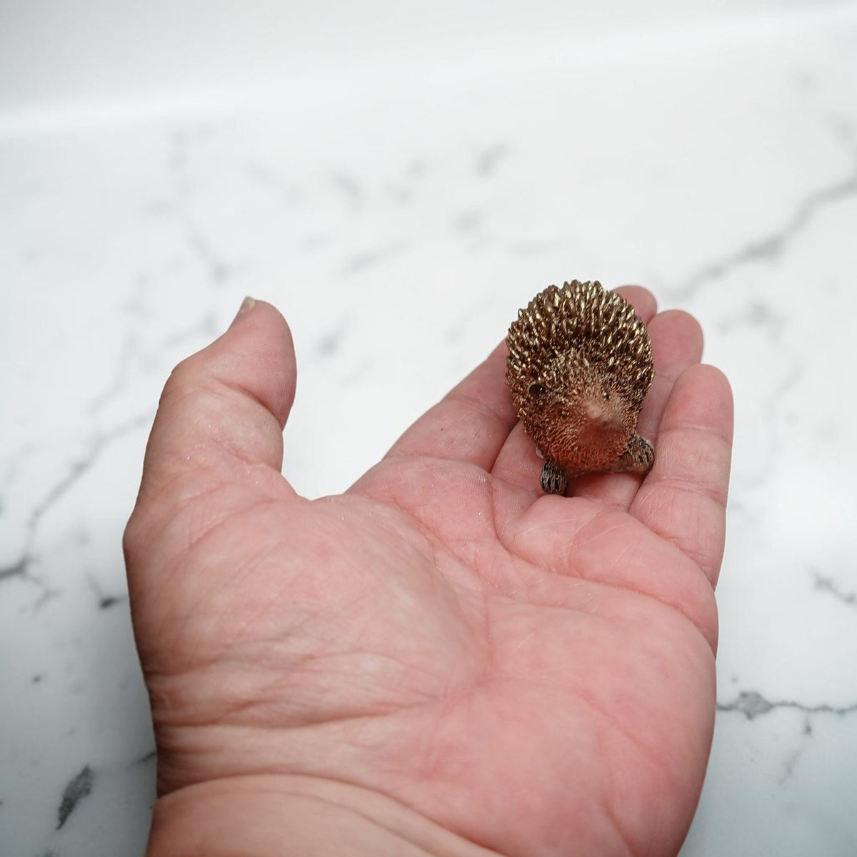 Cute little handmade resin hedgehogs