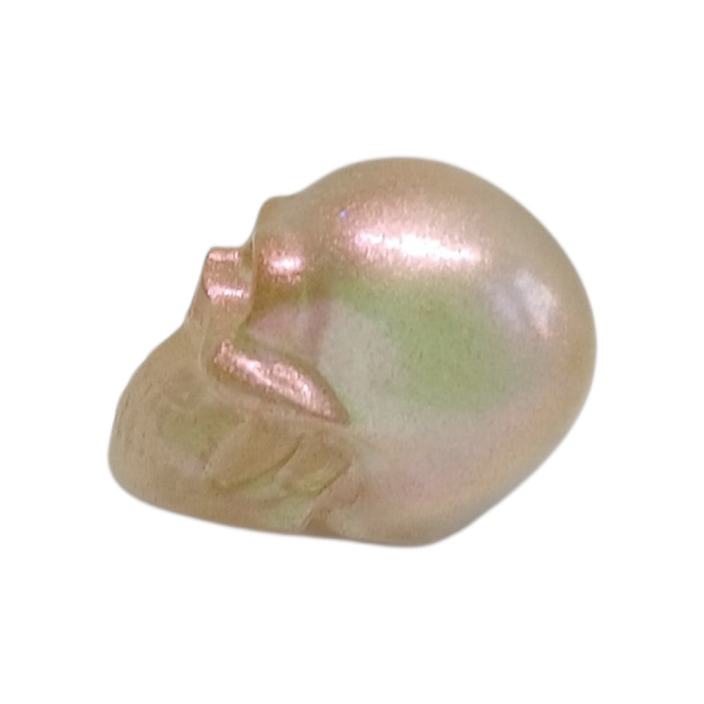 Shimmery peach resin skull
