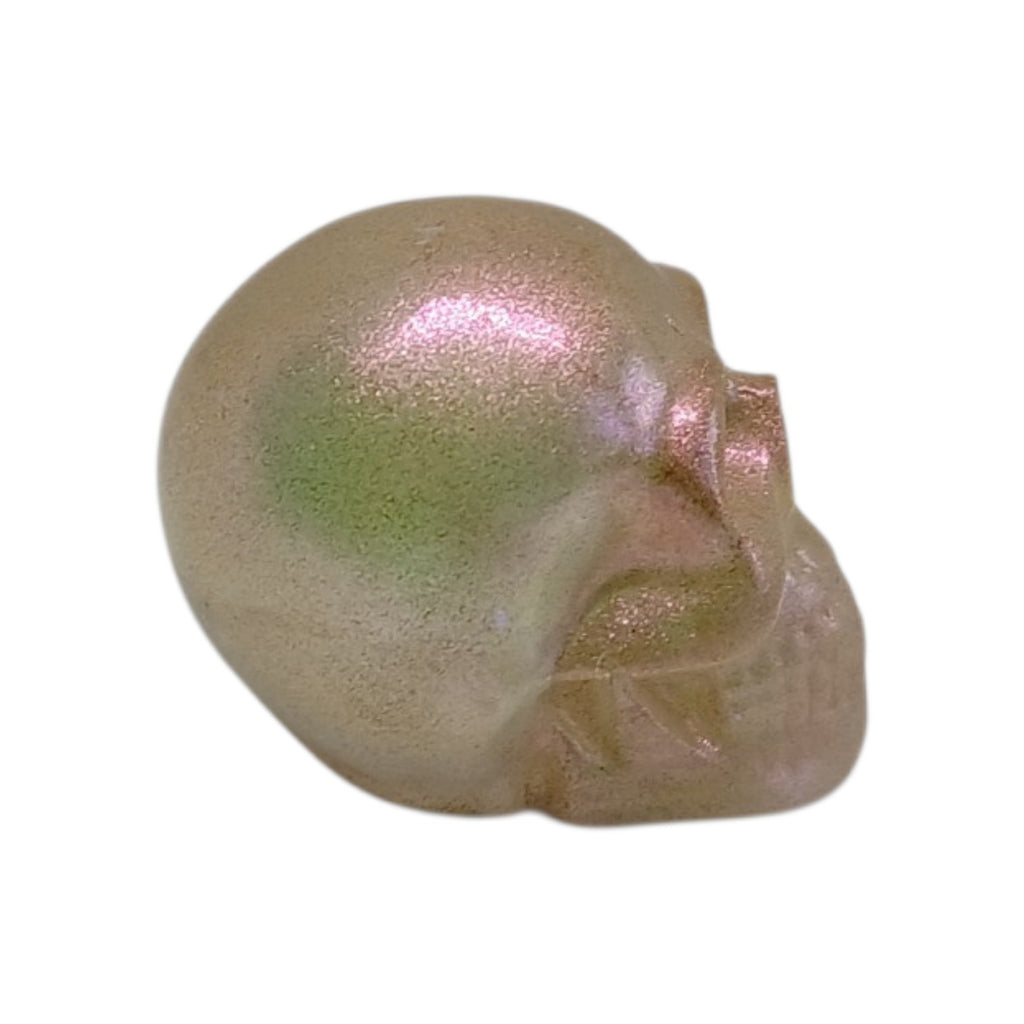 Shimmery peach resin skull